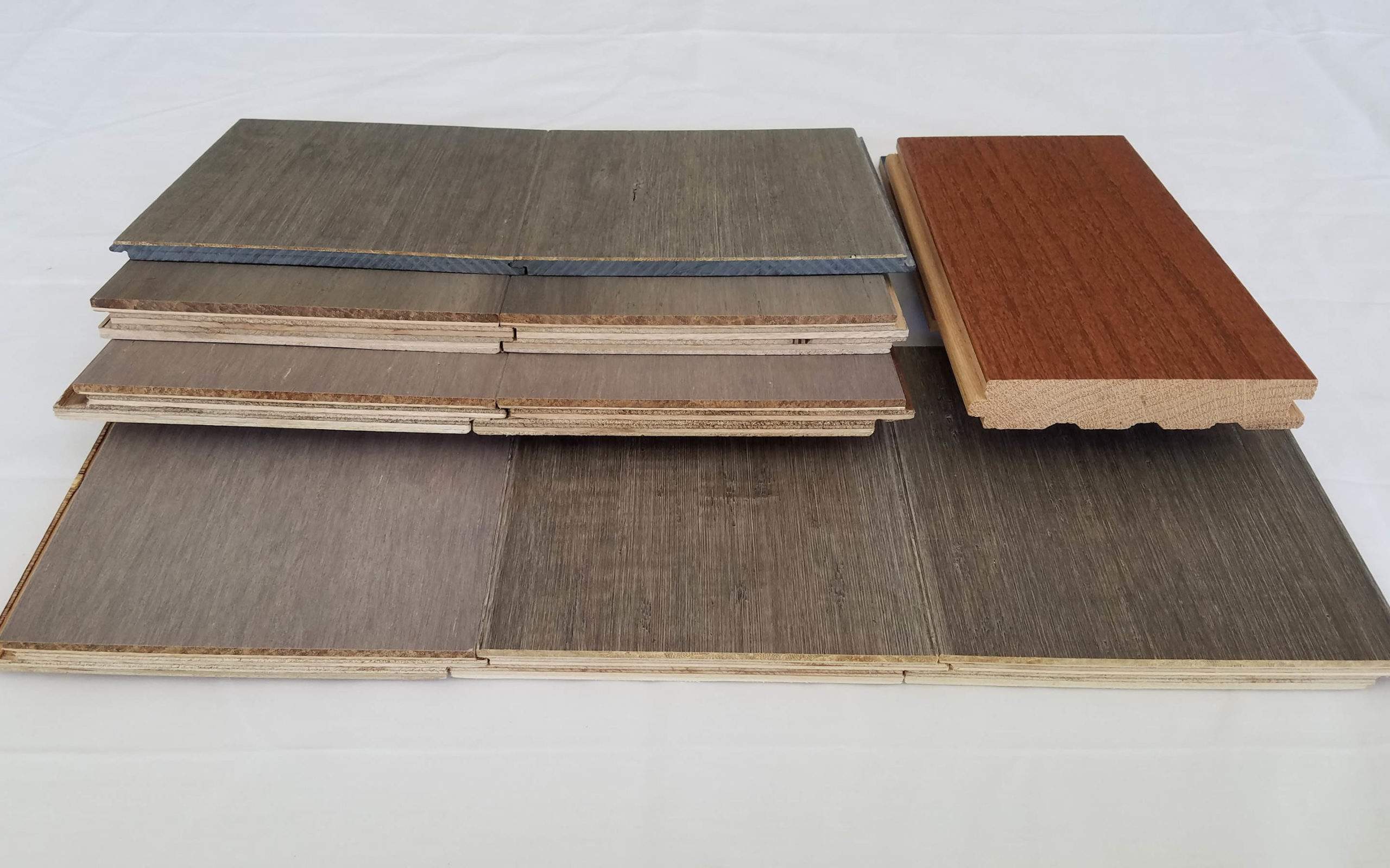 edge samples of engineered wood and hardwood flooring