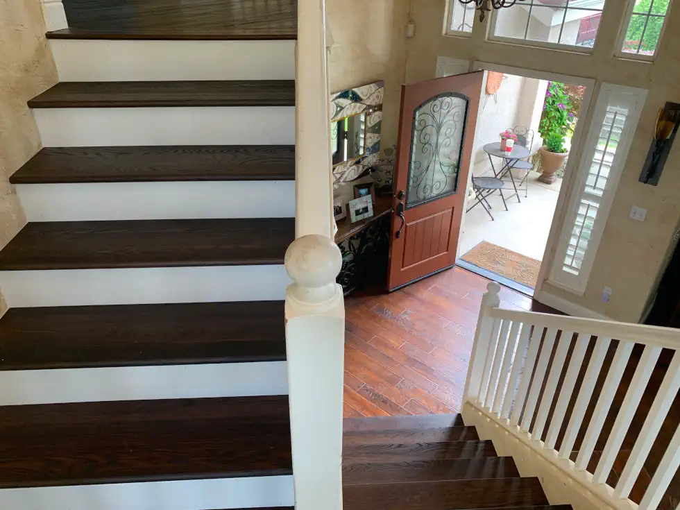 staircase with plank steps and painted white risers